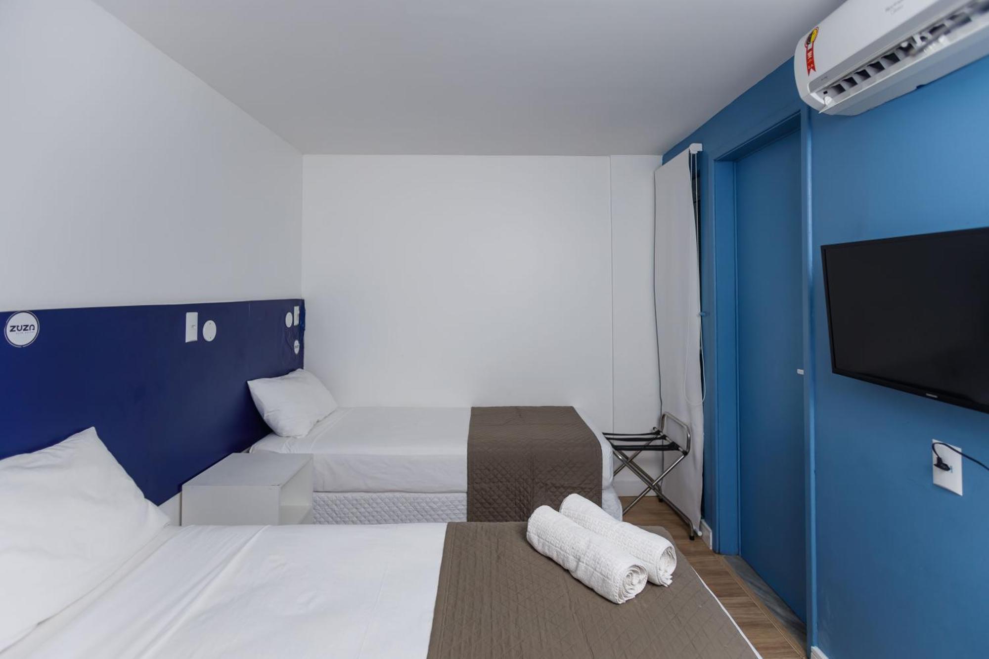 Zuza Slim Suítes Hotel
